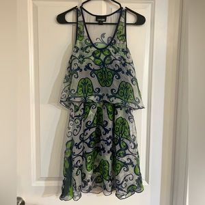 Silk patterned dress with flowy feel and tight bodycon dress underneath